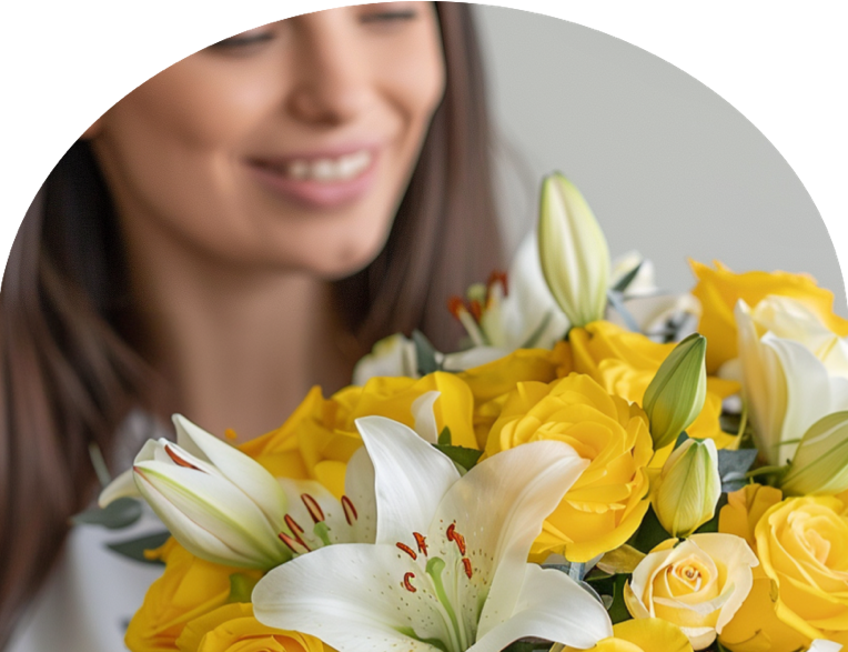 image of woman enjoying her flower delivery